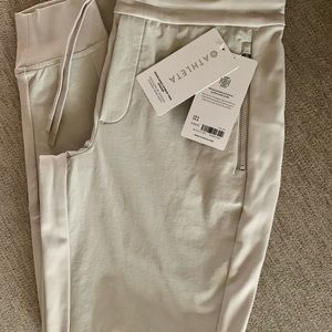 Athleta Jogger-Headlands Hybrid Trek size 6. Color: Birch Gray. New. Never worn.